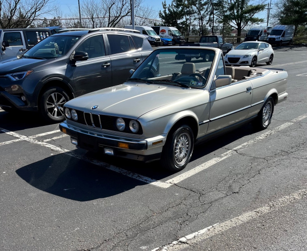BMW 325i convertible in parking lot