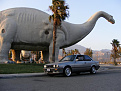 My e30 with one of the Cabazon Dinosaurs near Palm Springs, CA