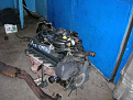 dirty used engine on the floor