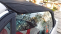 Door cracked to show how trailing edge of window will hit top